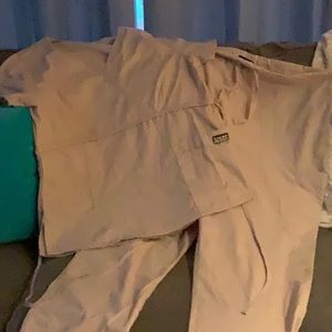 Butter soft scrubs by UA. Tan. Size large. Cargo style pants. Double pocket top